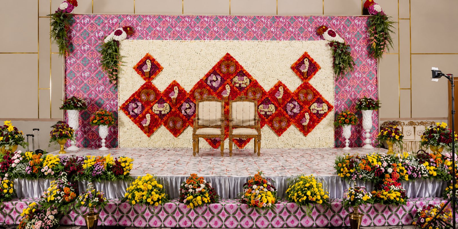 Stage backdrop with red and white floral patterns