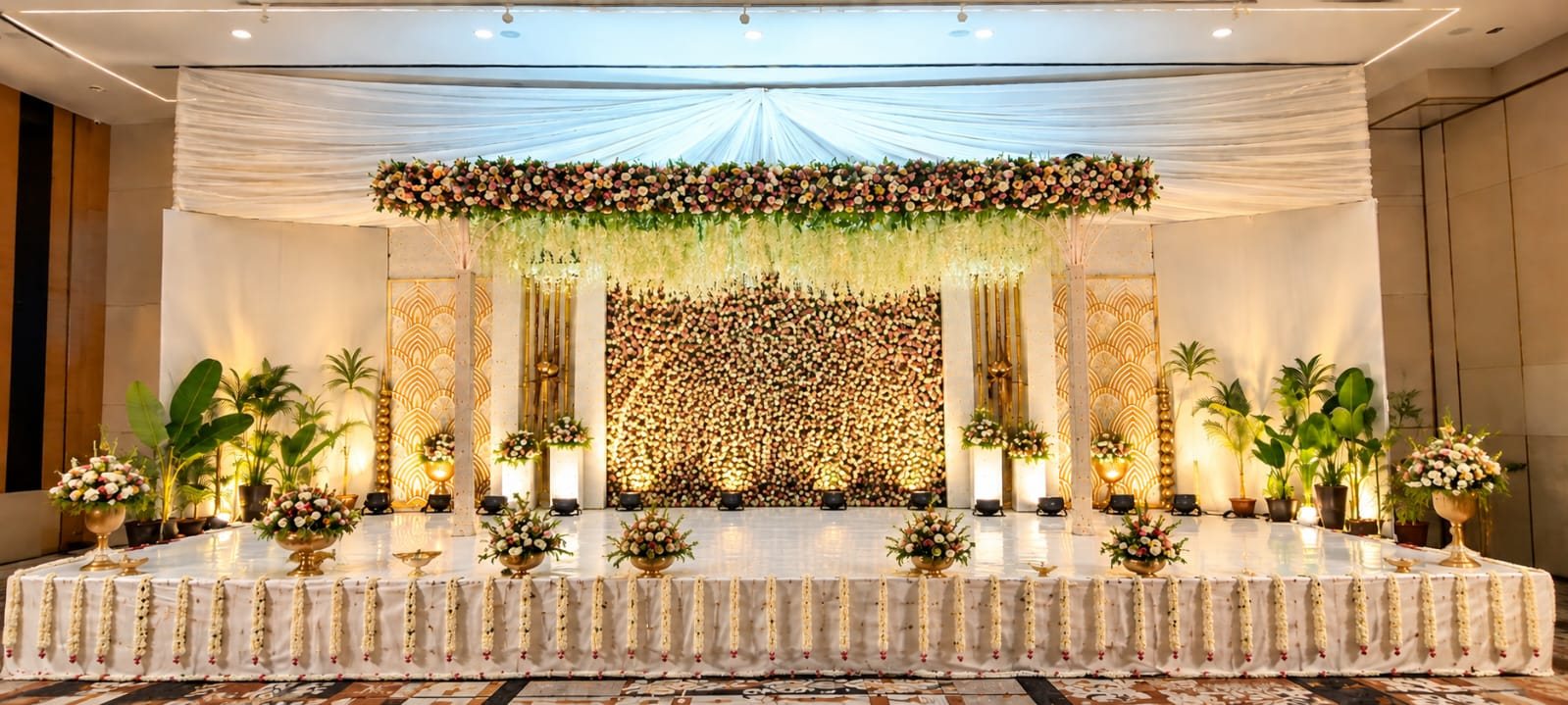 Long white floral stage decoration