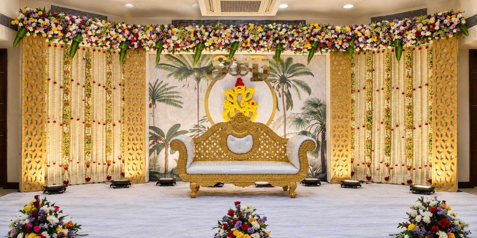 Golden pillars and floral stage with throne
