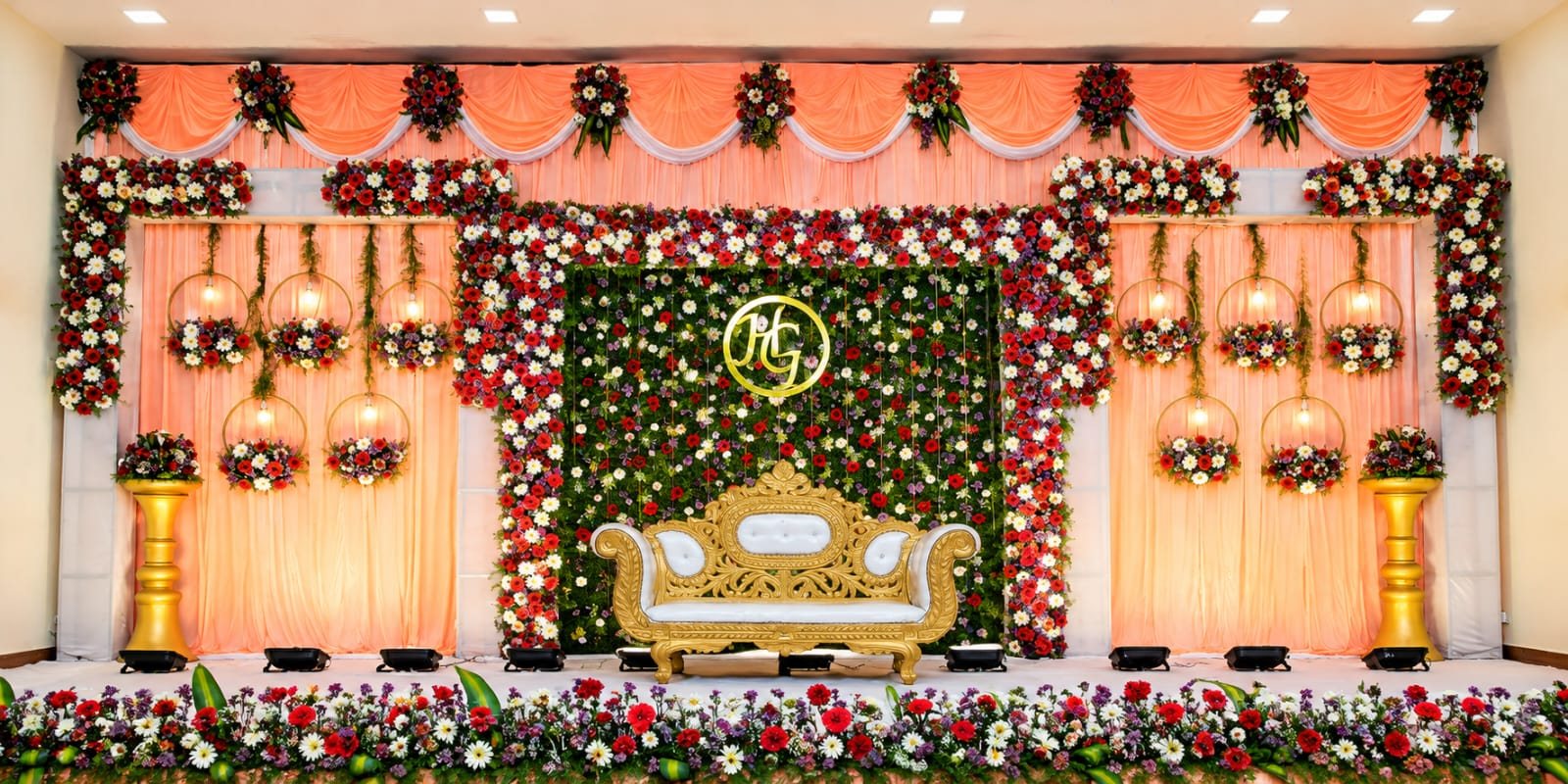 Coral and green floral stage with monogram
